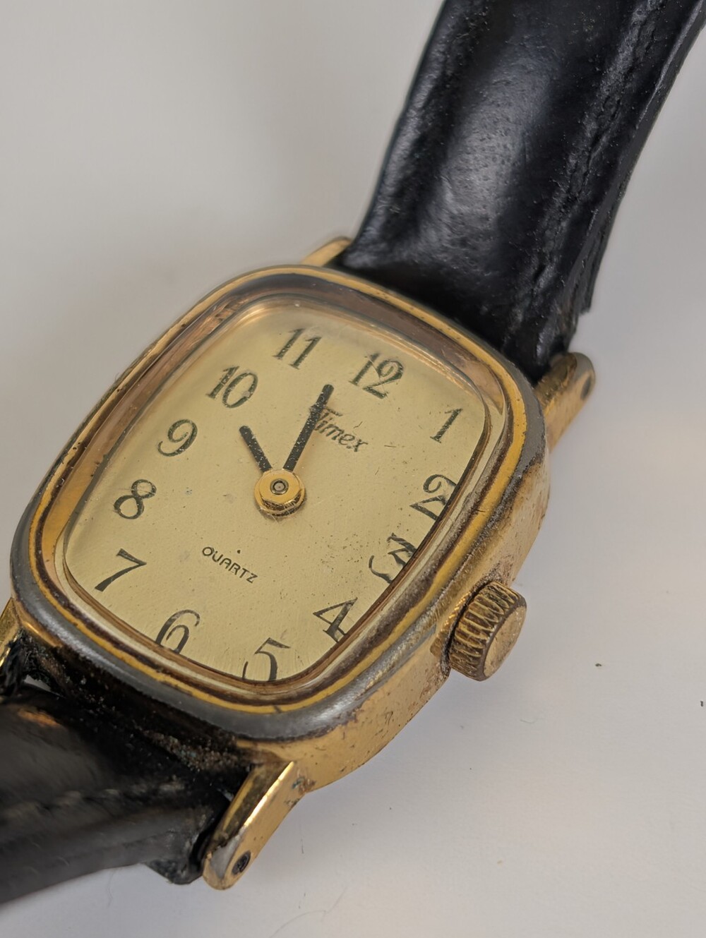 ​Vintage Timex Women's Gold Tone Quartz Watch Black Leather Strap